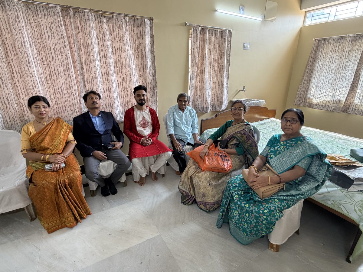 Multi-generational group of six seated together during the gathering