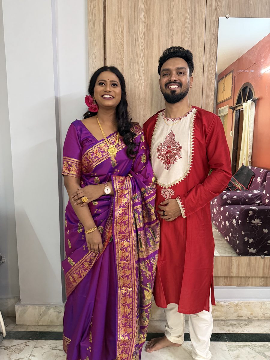 Rituparna and Shoumo in a formal portrait together in their wedding attire